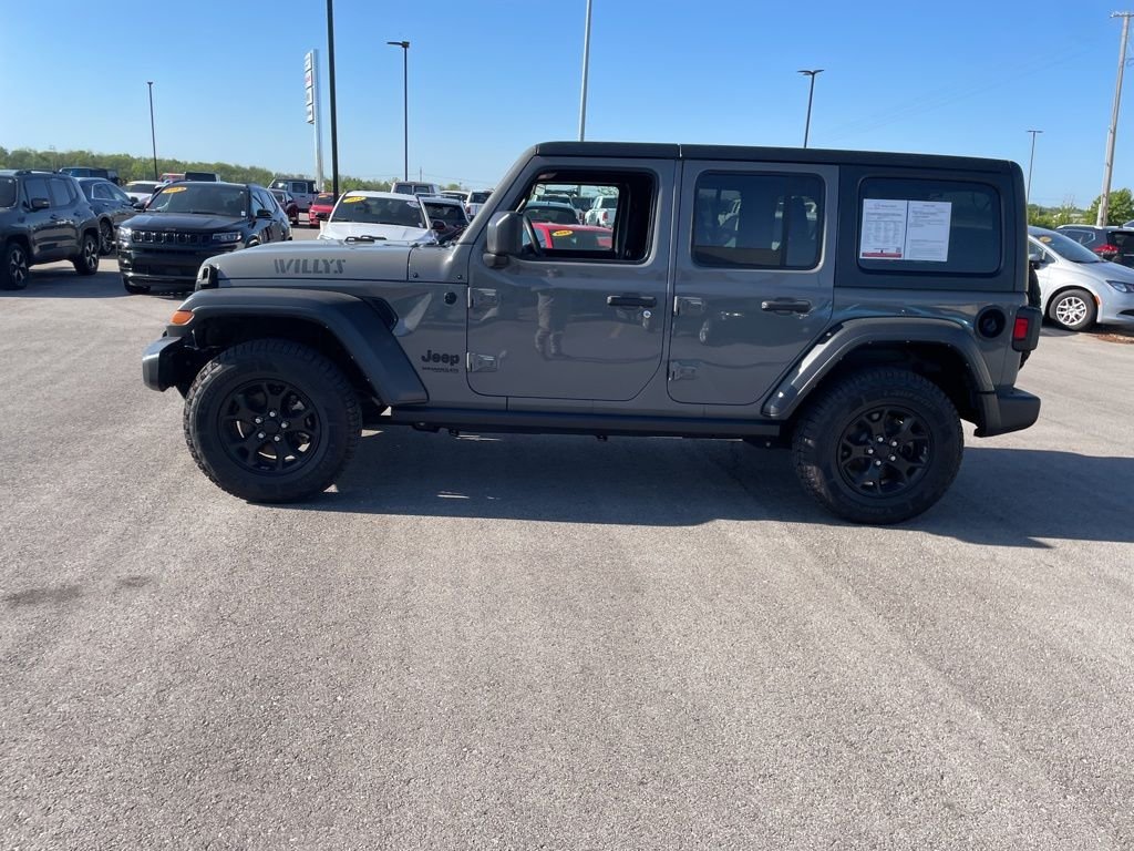 Certified 2021 Jeep Wrangler Unlimited Willys Sport with VIN 1C4HJXDN9MW773695 for sale in Kansas City