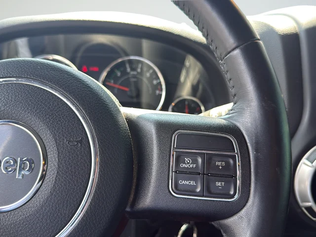 Used 2017 White Jeep Unlimited Sahara image 17