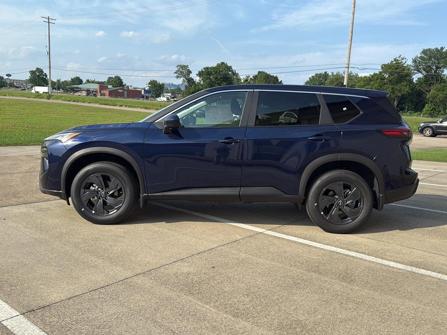 New 2026 Deep Ocean Blue Pearl Nissan SV image 4