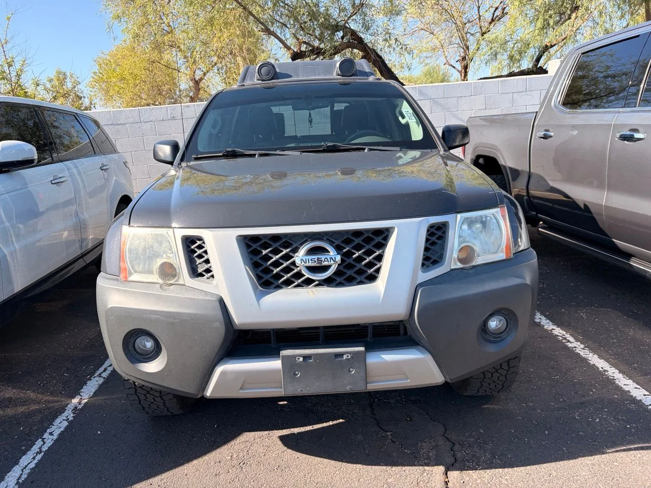 Used 2013 Night Armor Pearl Mica Nissan PRO-4X image 3