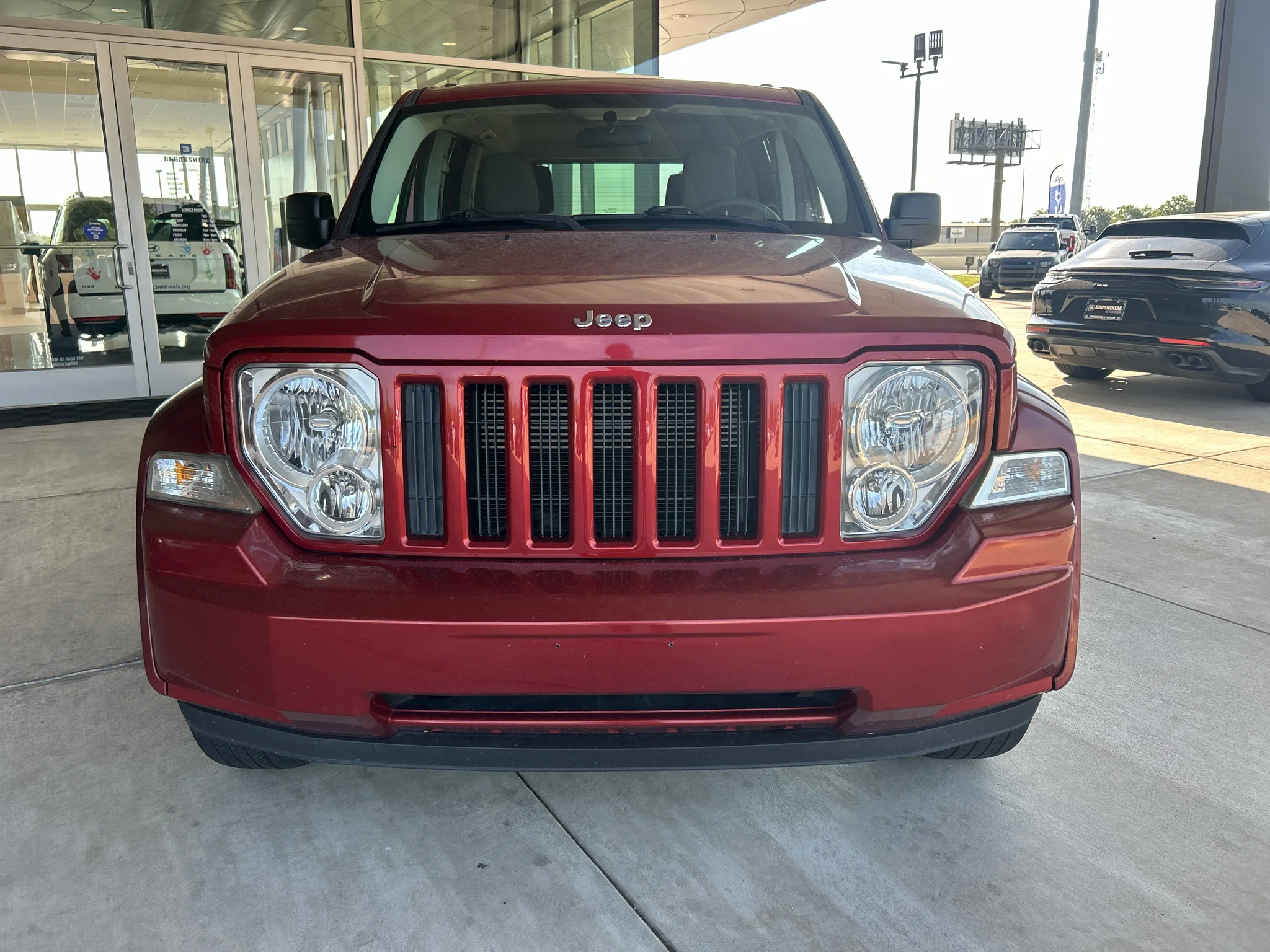 Used 2008 Inferno Red Crystal Pearlcoat Jeep Sport image 7