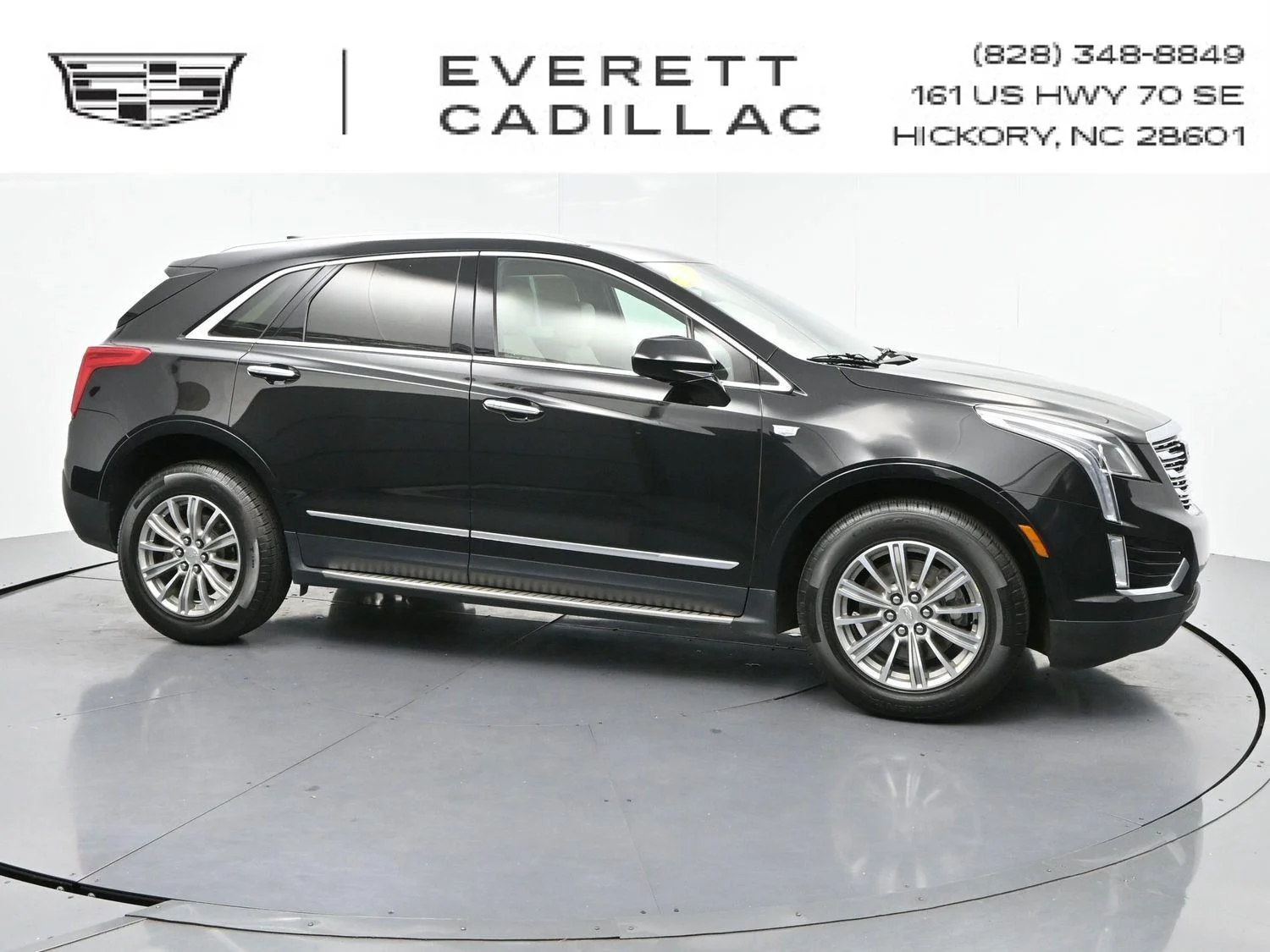 Used 2017 STELLAR BLACK METALLIC Cadillac FWD image 1