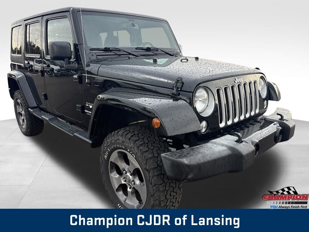 Used 2016 Black Jeep Unlimited Sahara image 9