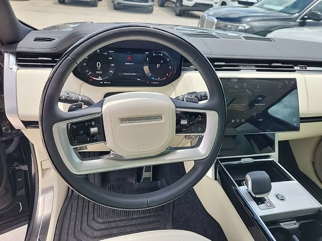 Used 2025 Santorini Black Metallic Land Rover SE image 4