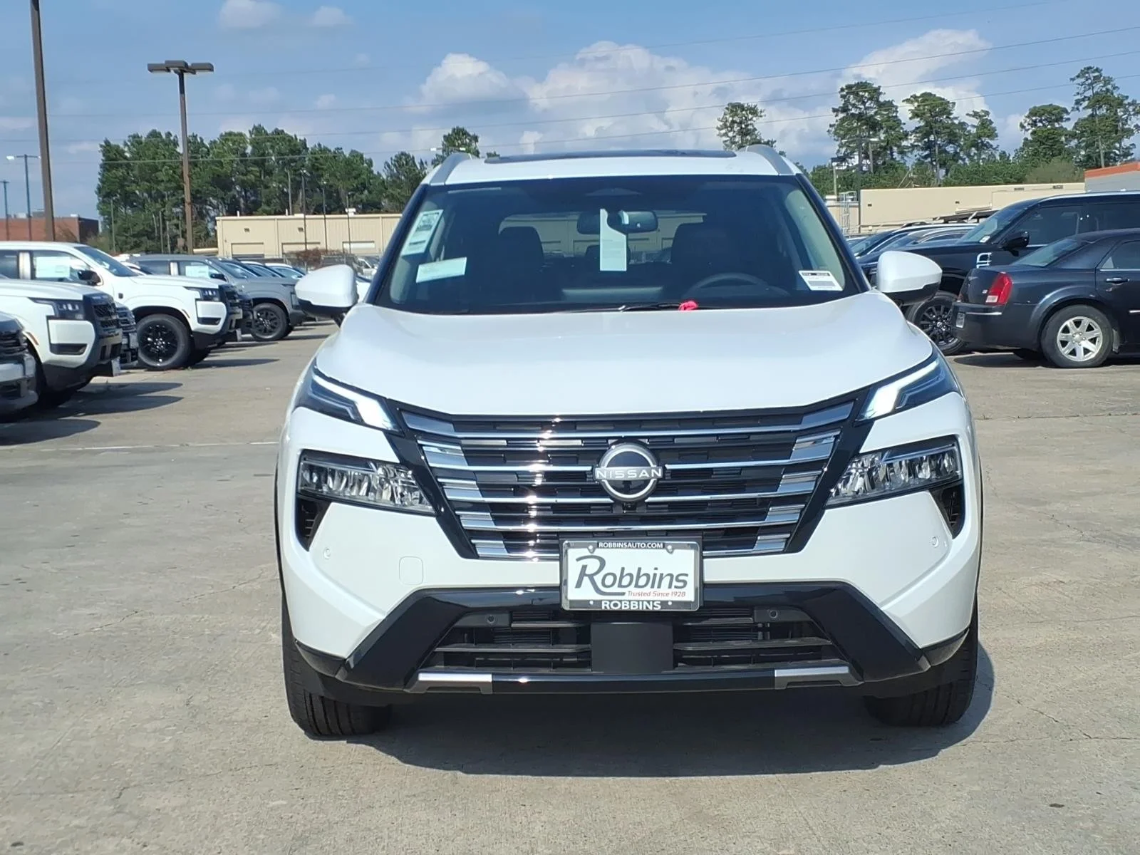 2026 Nissan Rogue Platinum White at Robbins Nissan