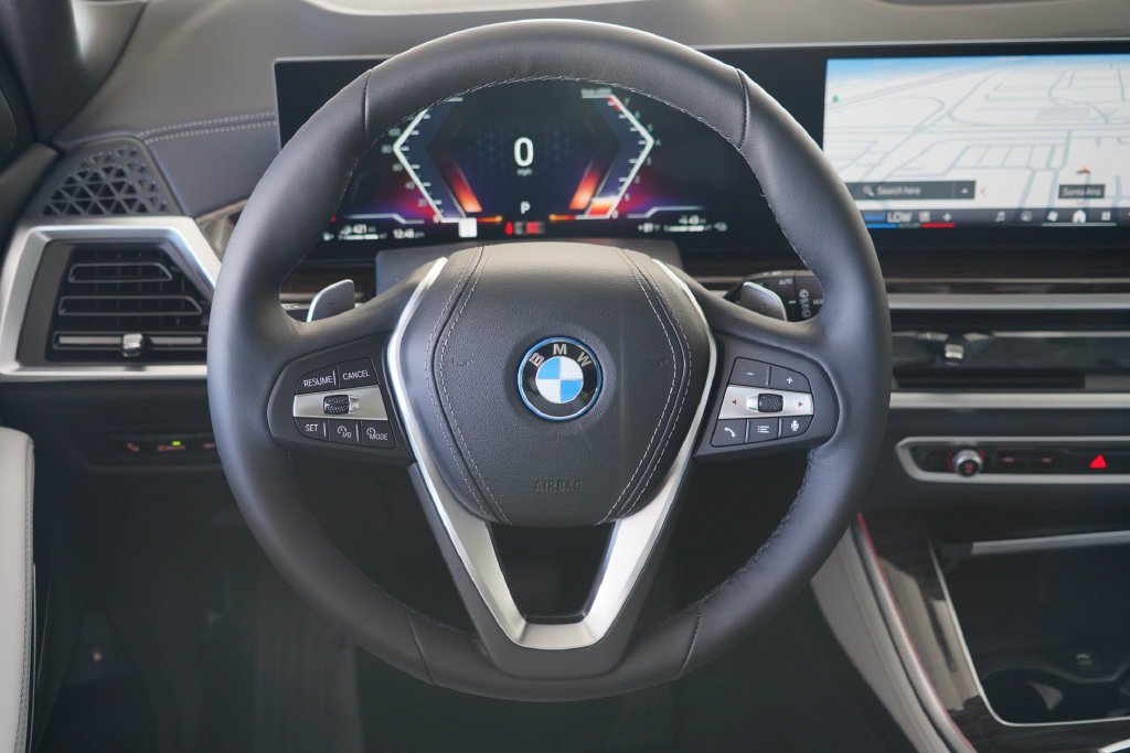 New 2026 Black Sapphire Metallic BMW xDrive50e image 23