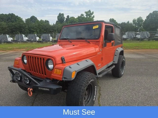 Used 2005 Impact Orange Cle Jeep Sport image 2