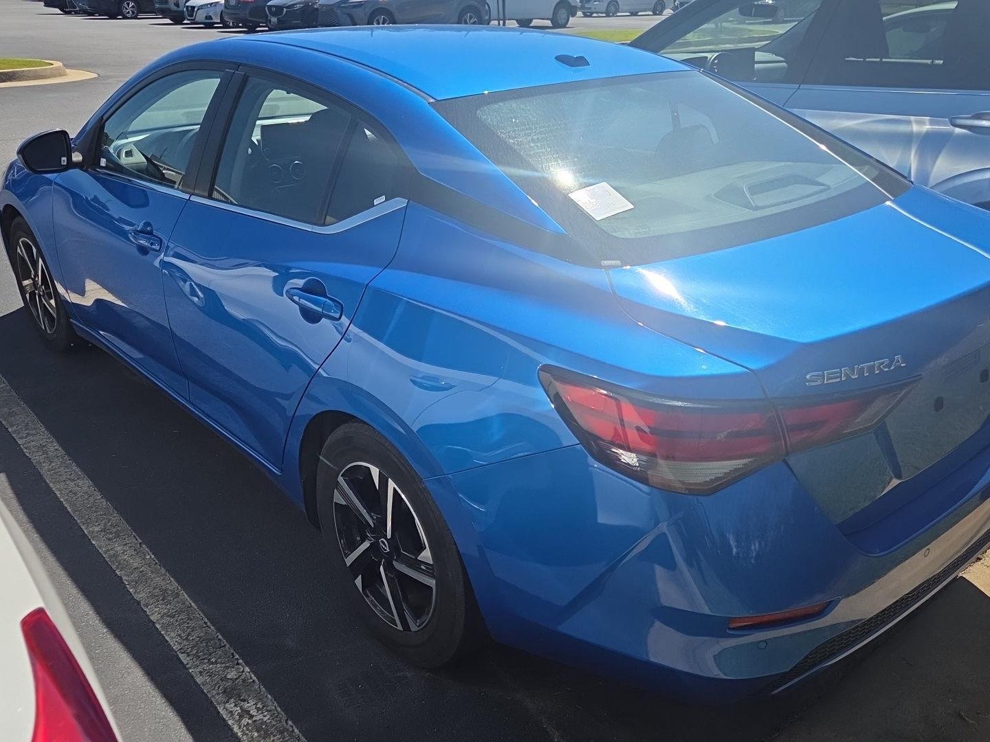 Used 2025 Electric Blue Metallic Nissan SV image 4