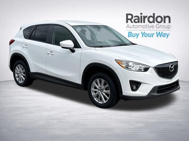 Used 2015 Crystal White Pearl Mica Mazda Touring image 1