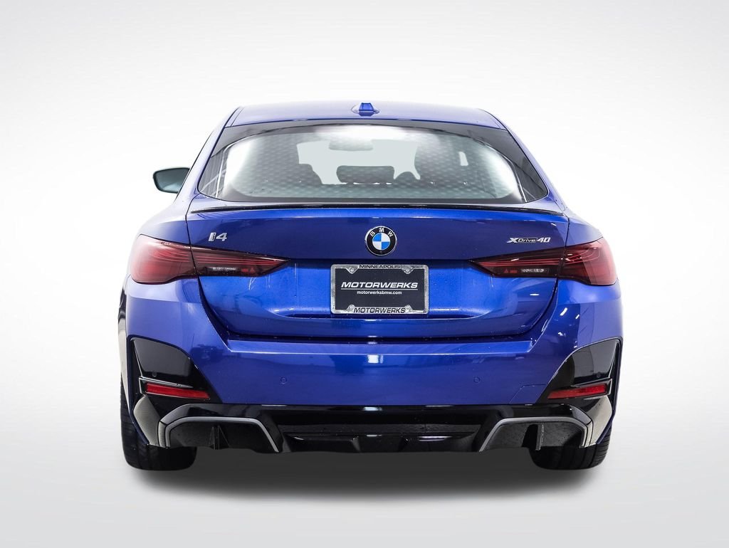 Used 2026 Blue Metallic BMW xDrive40 image 4