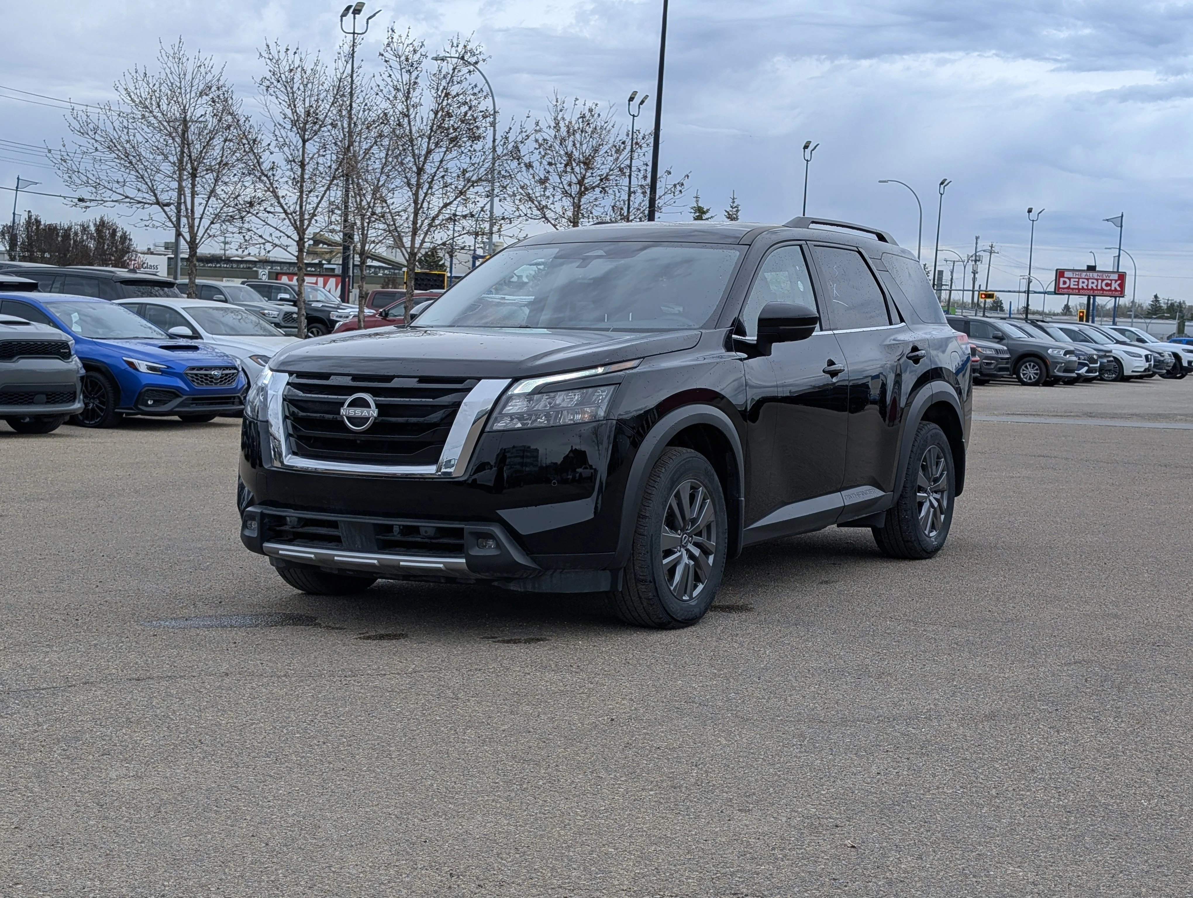 Used 2024 Gun Metallic Nissan SV image 2