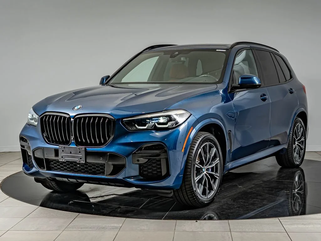 Used 2023 Phytonic Blue Metallic BMW M50i image 1