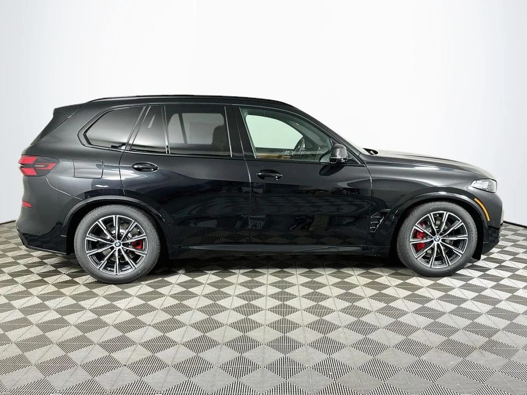 New 2026 Black Sapphire Metallic BMW xDrive50e image 4