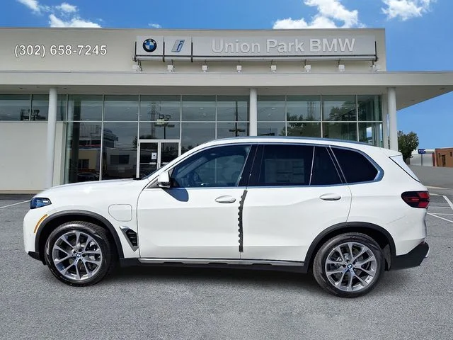 New 2026 Alpine White BMW xDrive50e image 7