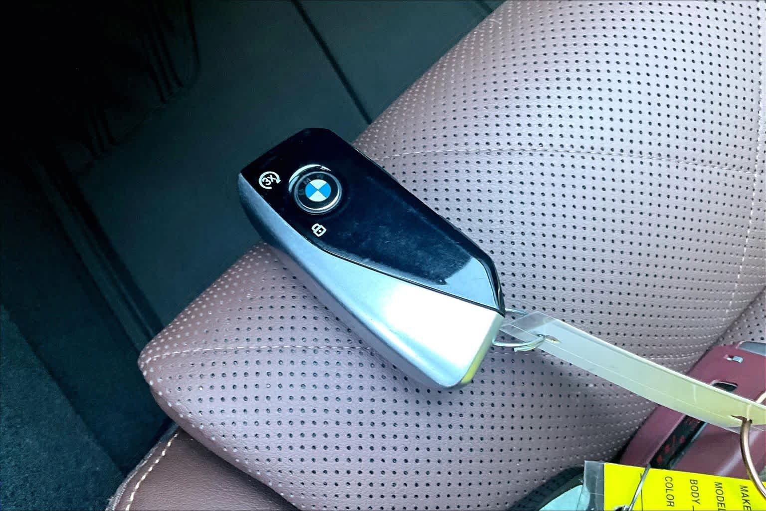 Certified Used 2025 Mineral White Metallic BMW xDrive40i image 12