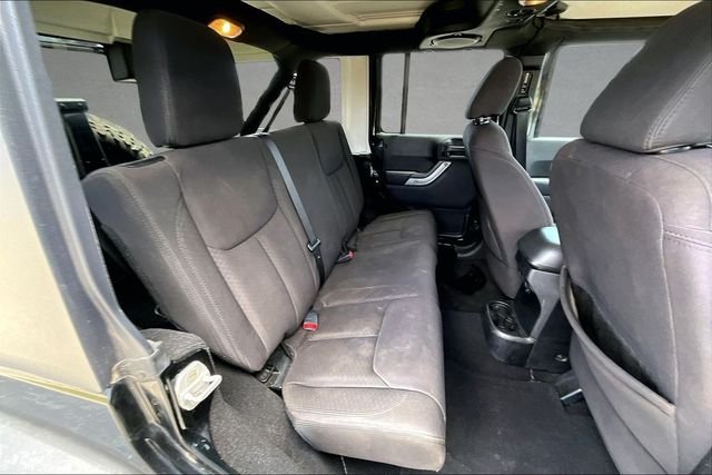 Used 2013 Black Jeep Unlimited Sport image 20