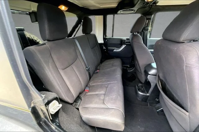 Used 2013 Black Jeep Unlimited Sport image 20