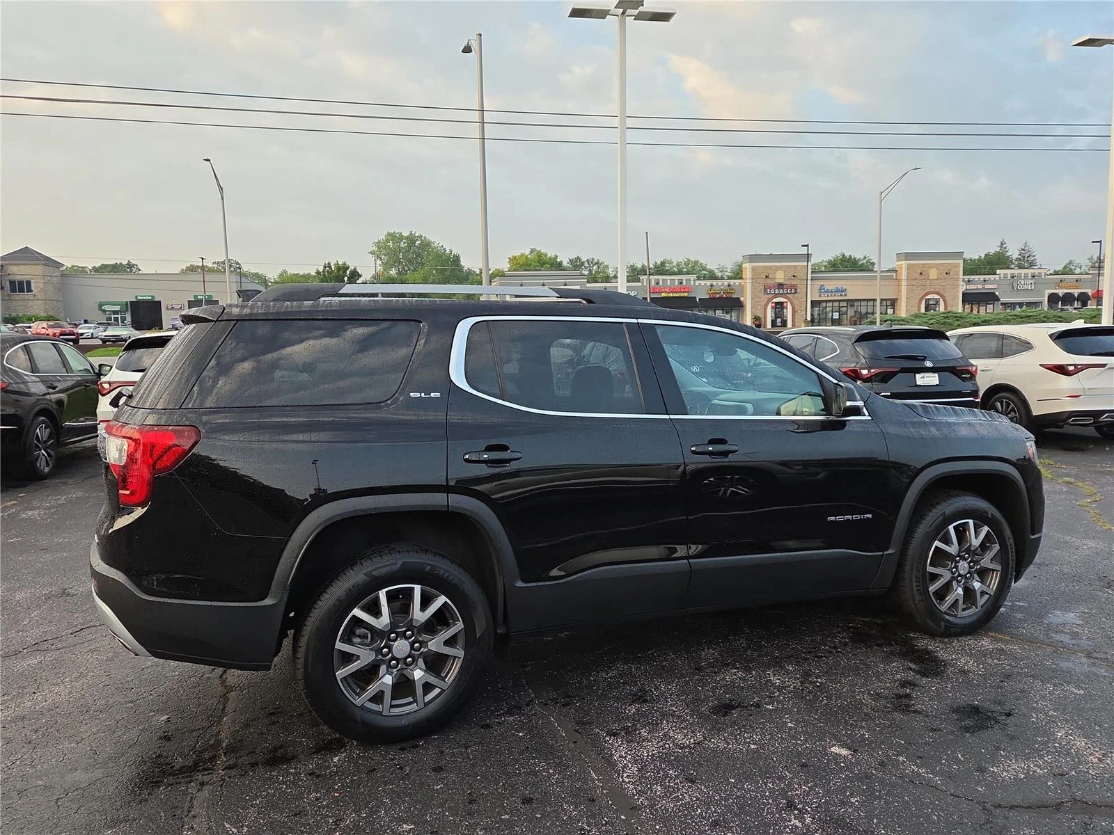 Used 2023 Ebony Twilight Metallic GMC SLE image 30