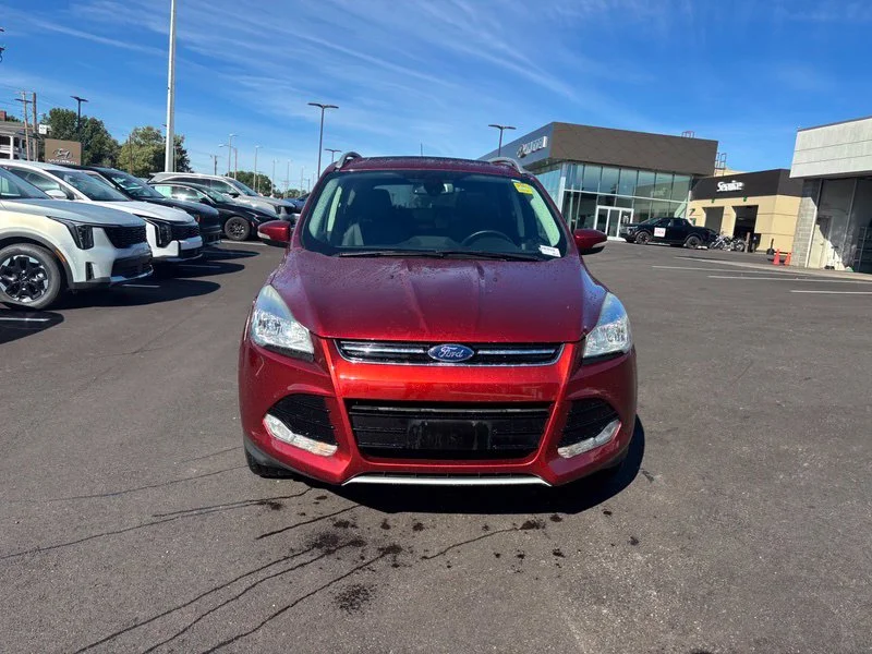 Used 2016 Orange Ford Titanium image 2