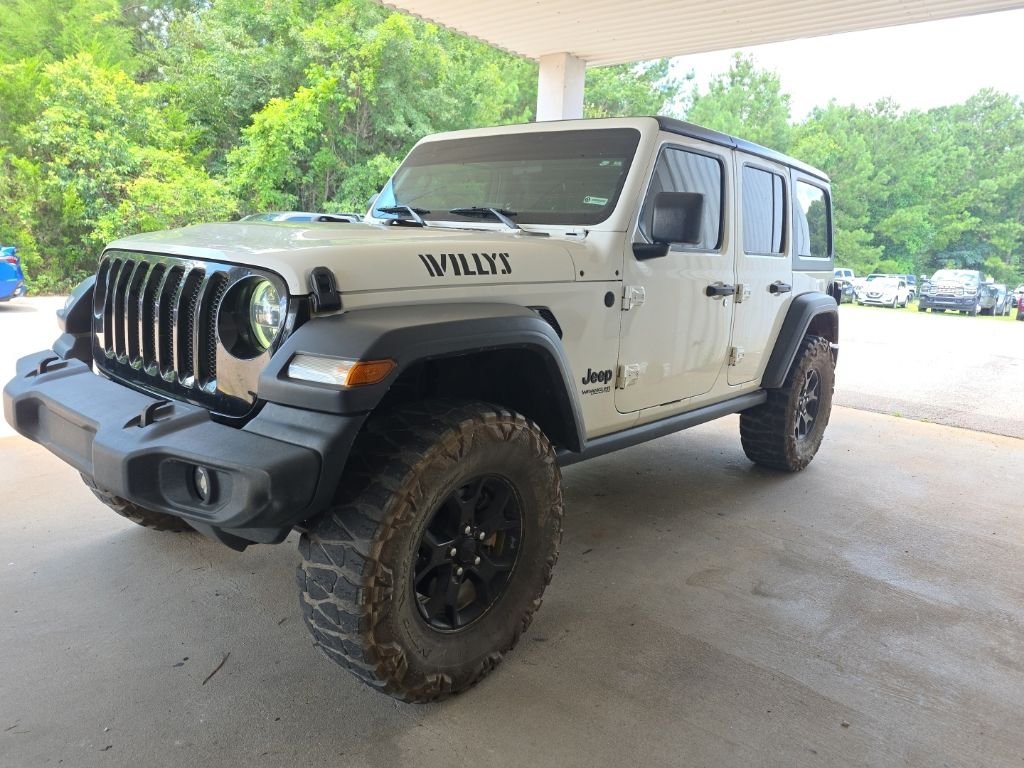 Used 2020 White Jeep Unlimited Sport image 1