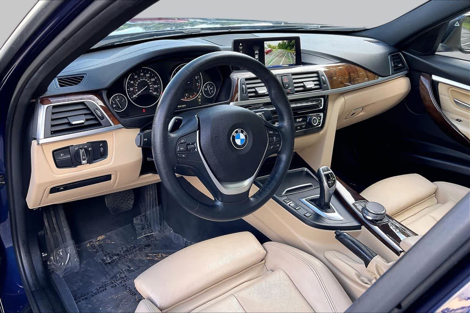 Used 2018 Mediterranean Blue Metallic BMW 330i xDrive image 17