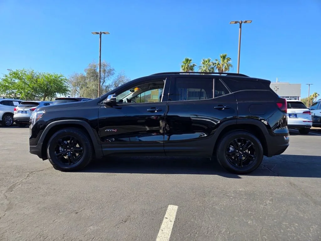 Used 2023 Ebony Twilight Metallic GMC AT4 image 3