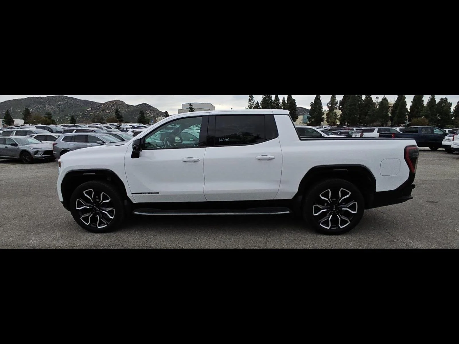 Used 2025 Summit White GMC Extended Range Denali image 8