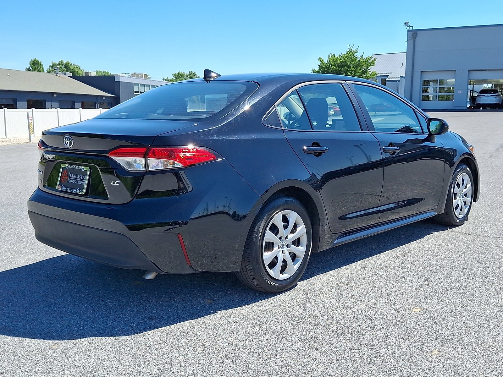 Used 2025 Midnight Black Metallic Toyota LE image 7