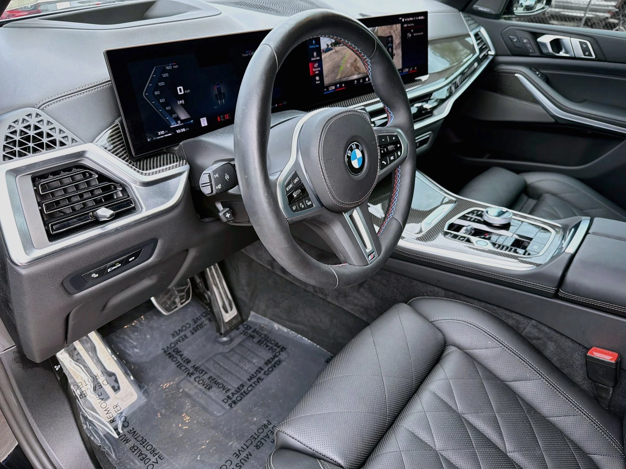 Used 2025 Black Sapphire Metallic BMW M60i image 27