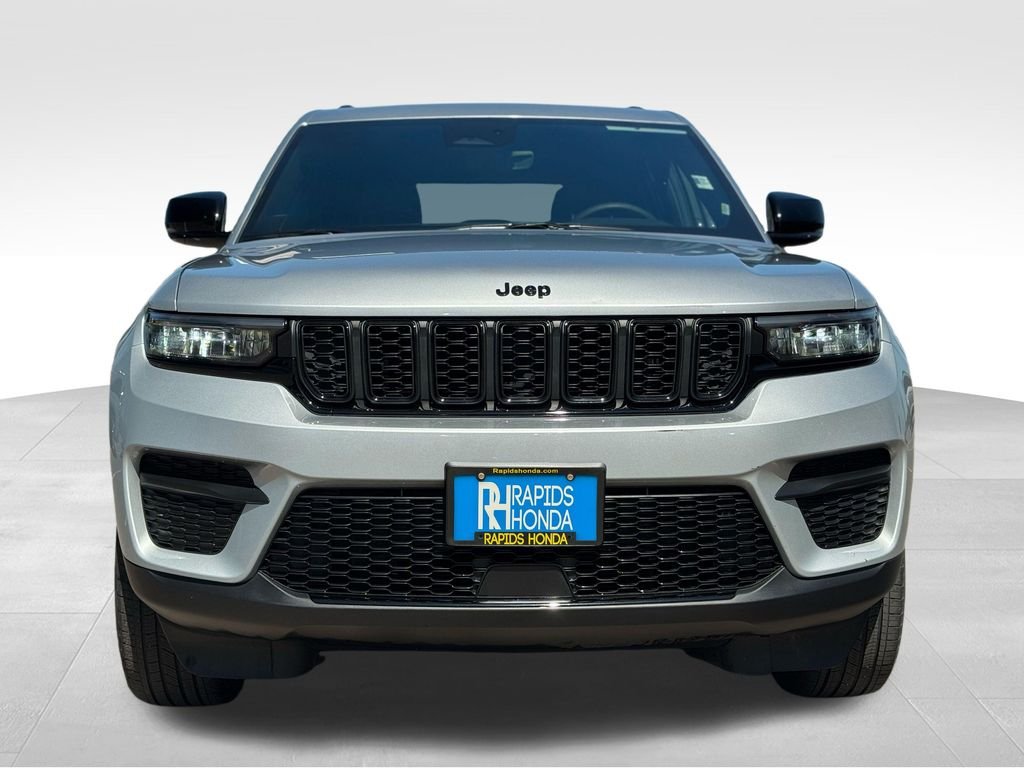 Used 2025 Jeep Grand Cherokee Altitude with VIN 1C4RJHAGXS8699320 for sale in Coon Rapids, Minnesota