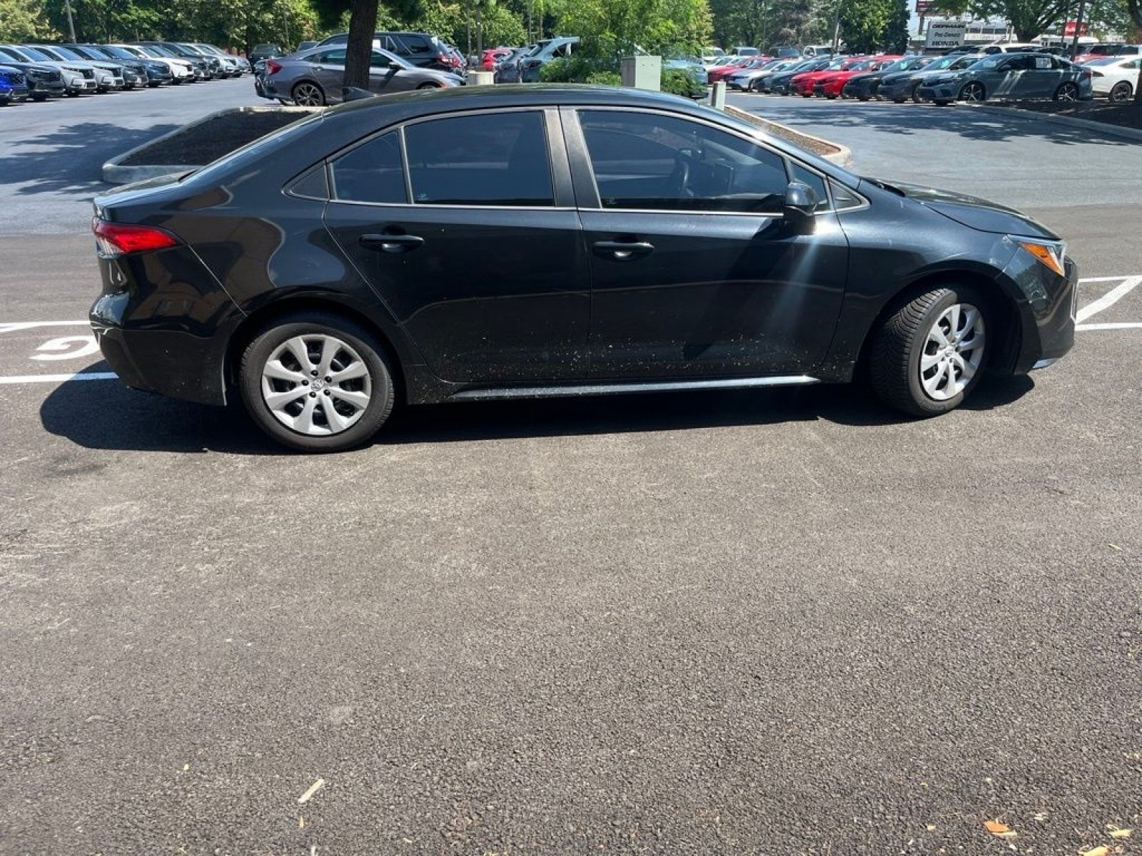 Used 2021 Black Sand Pearl Toyota LE image 5