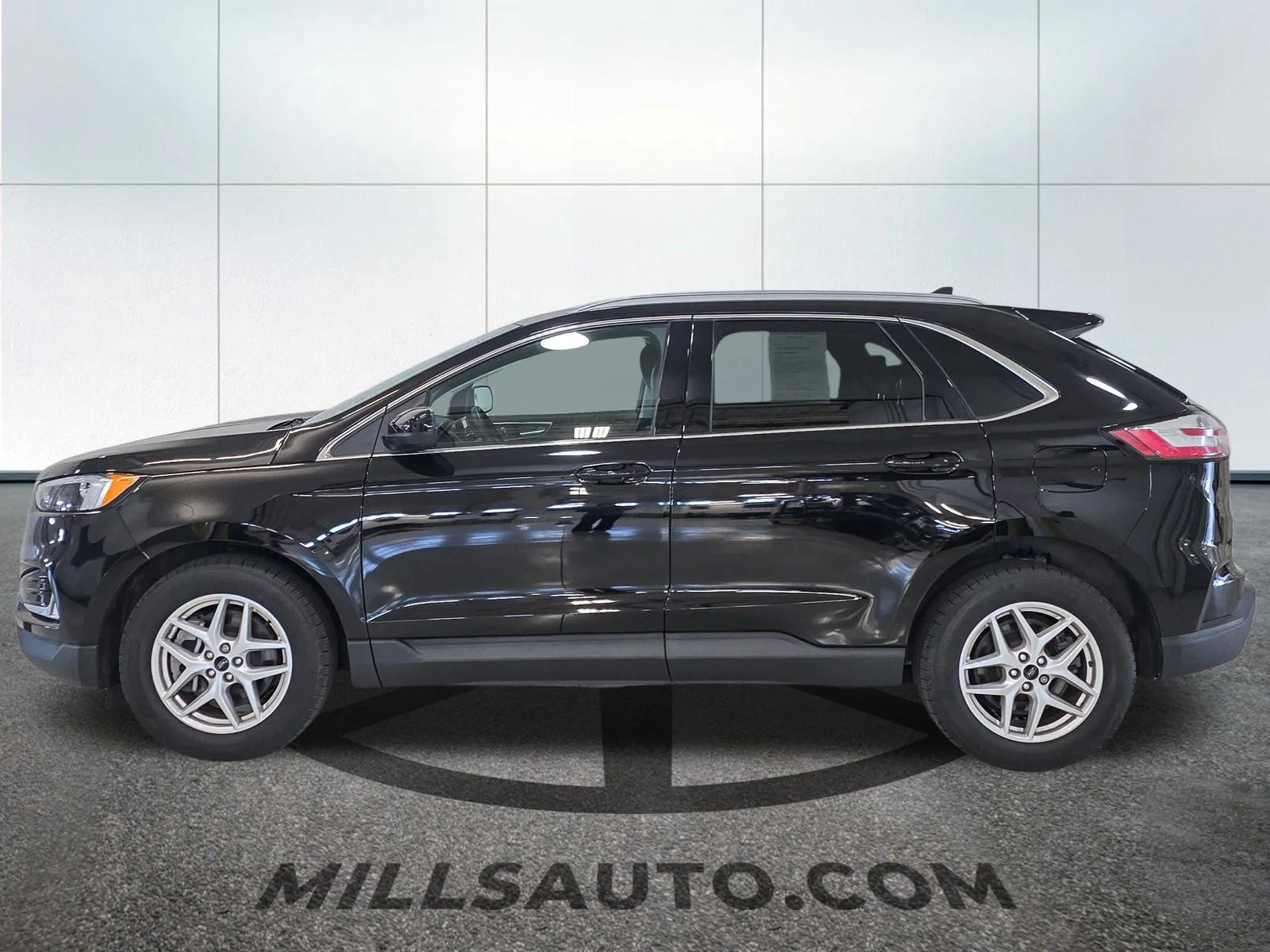 Used 2024 Agate Black Metallic Ford SEL image 3