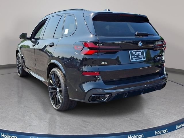 New 2026 Black Sapphire Metallic BMW M60i image 6