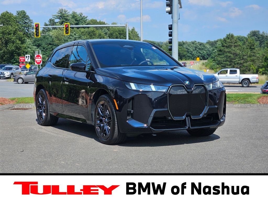 Used 2026 Black BMW xDrive60 image 1