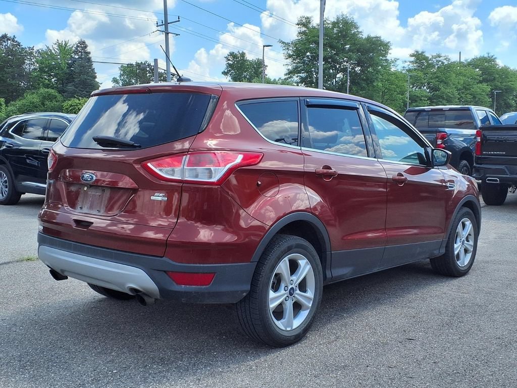 Used 2014 Orange Ford SE image 4