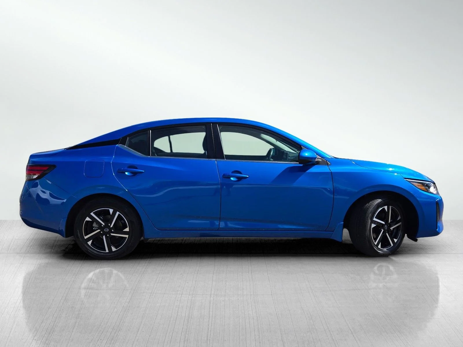 Used 2025 Electric Blue Metallic Nissan SV image 3