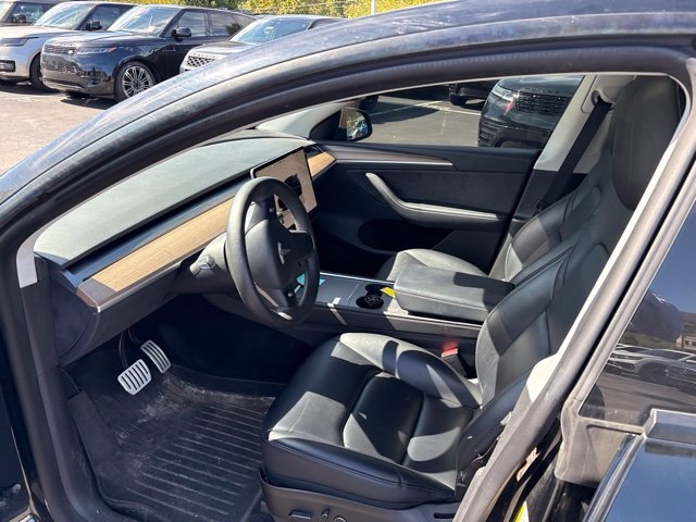 Used 2023 Solid Black Tesla Performance image 10