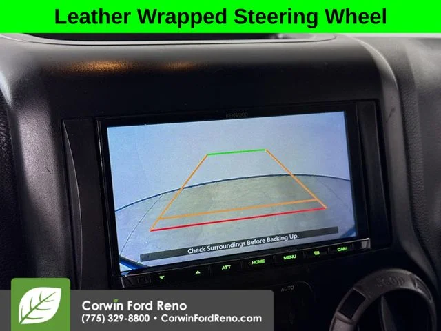 Used 2014 Billet Clearcoat Metallic Jeep Unlimited Sport image 12