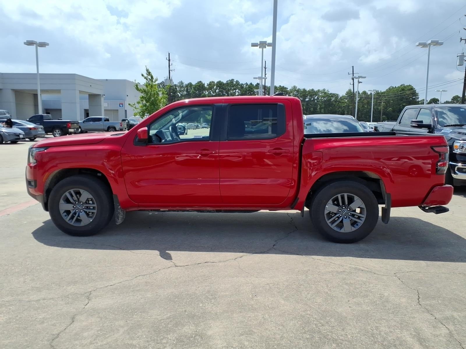 2026 Nissan Frontier SV Red at Robbins Nissan