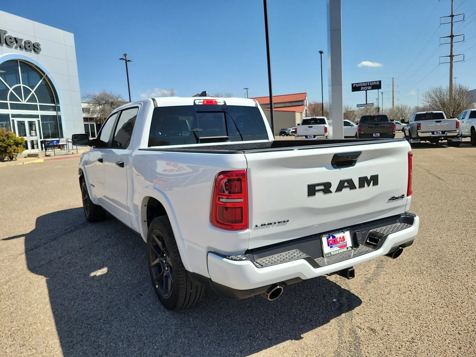 New 2026 Bright White Ram LIMITED CREW CAB 4X4 5