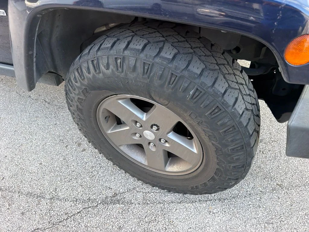 Used 2013 True Blue Pearlcoat Jeep Unlimited Freedom Edition image 11