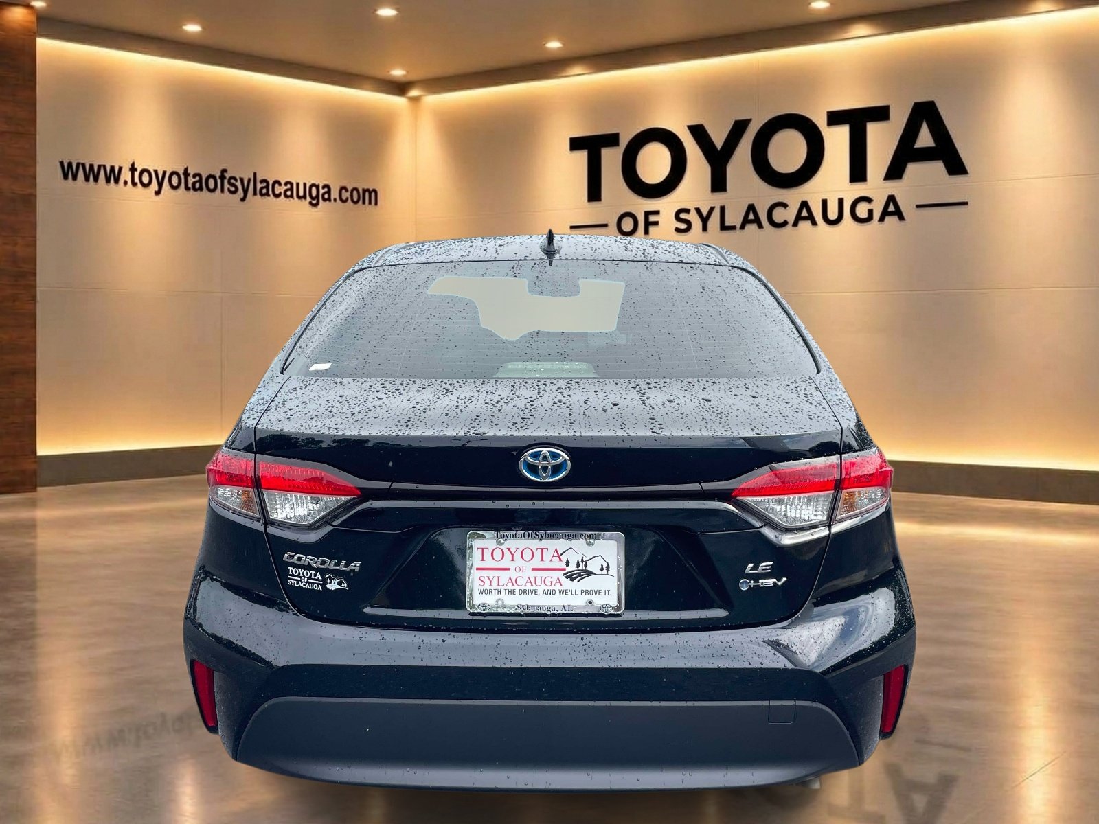 Used 2025 Midnight Black Metallic Toyota Hybrid LE image 3