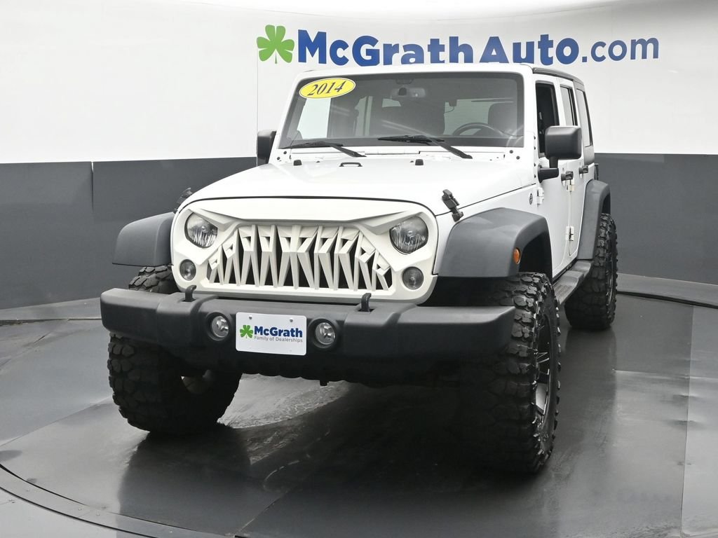 Used 2014 White Jeep Unlimited Sport image 21