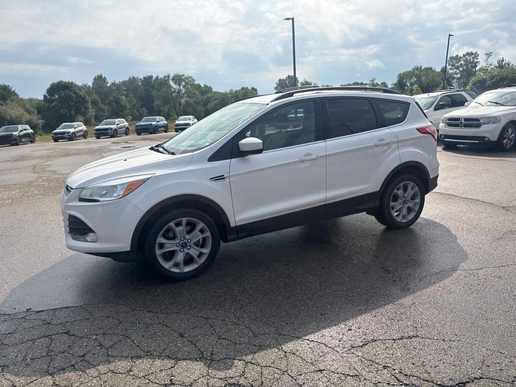 Used 2013 White Platinum Ford SE image 3