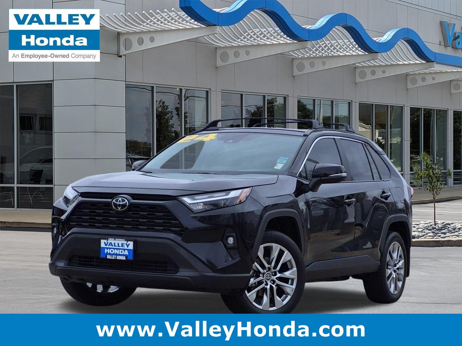 Used 2024 Midnight Black Metallic Toyota XLE Premium AWD image 1
