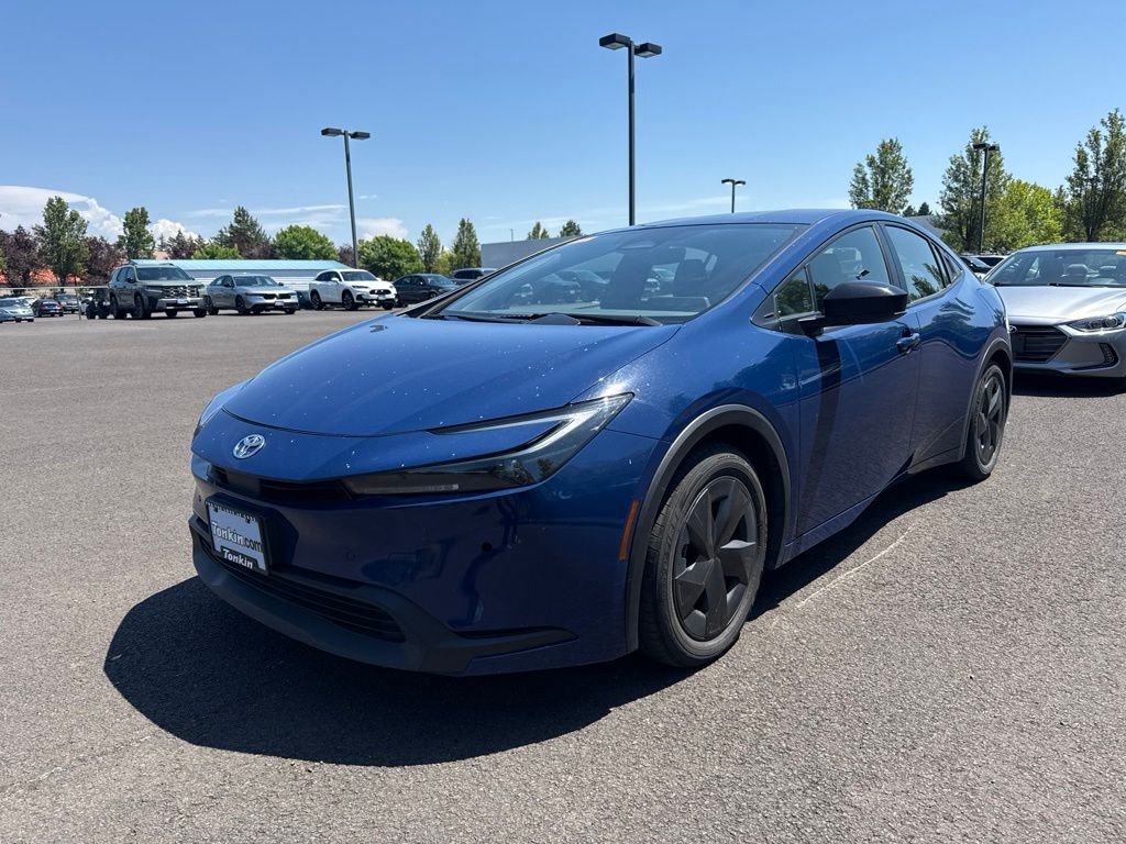 Used 2025 Reservoir Blue Toyota LE image 3