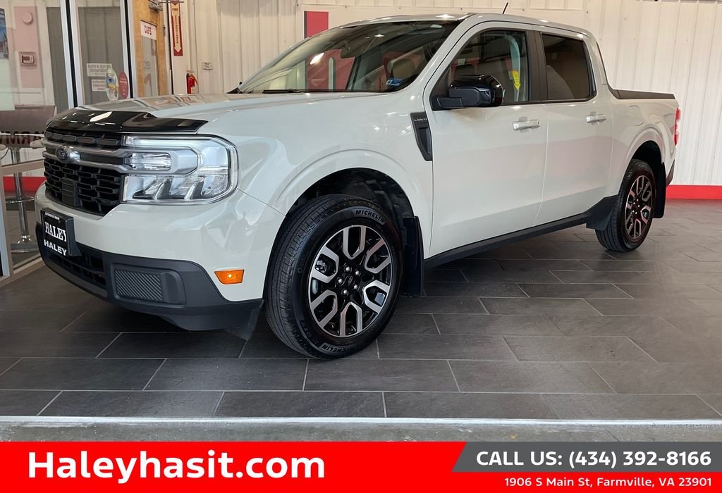 Used 2024 Beige Ford Lariat image 1