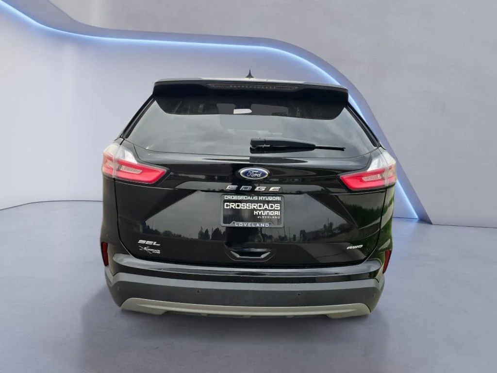 Used 2022 Agate Black Metallic Ford SEL image 4