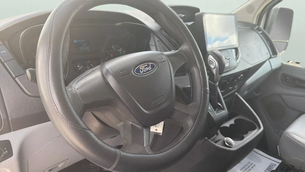 Used 2019 White Ford T-150 148" Med Rf 8600 GVWR Sliding RH Dr image 23