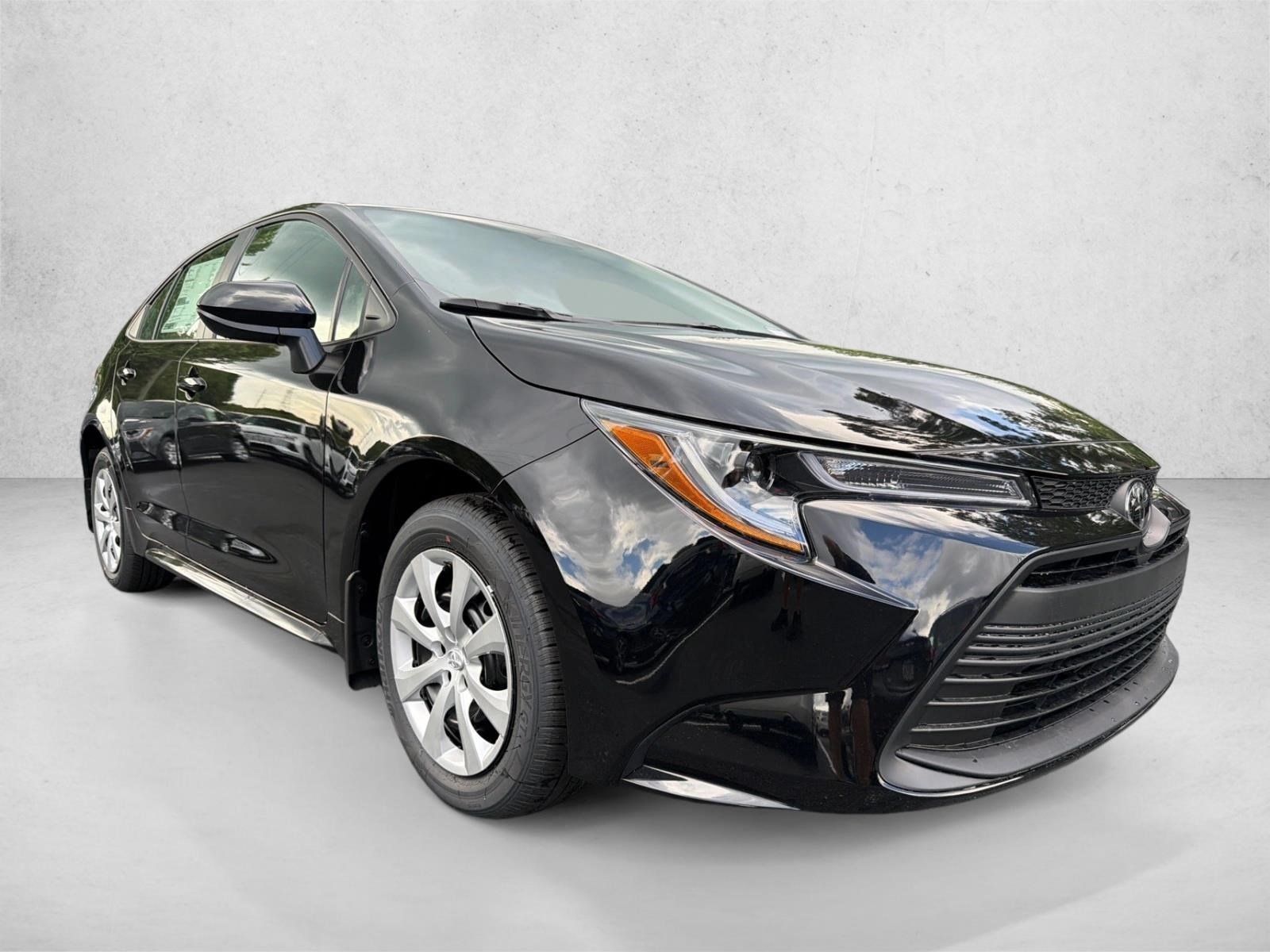 New 2026 Midnight Black Metallic Toyota LE image 1